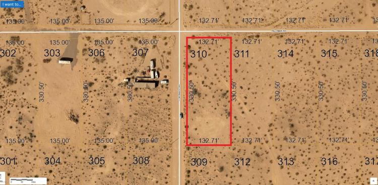 One Acre Corner Lot - Power Available - Well Maintained Dirt Road